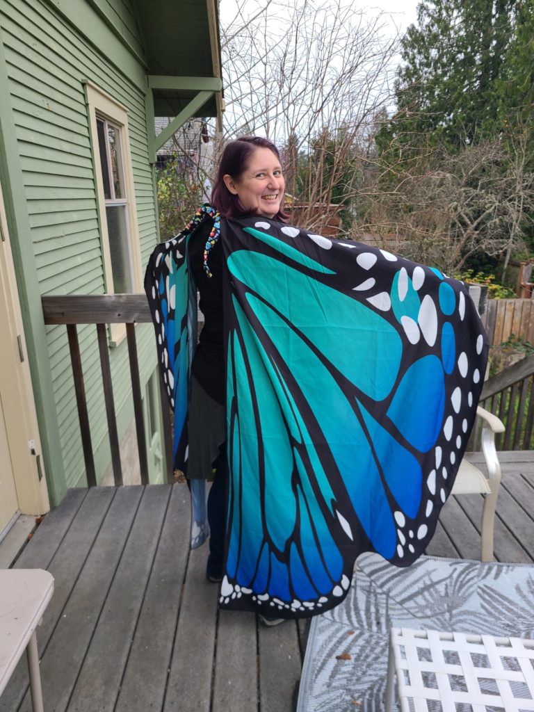 Teacher Sophia in a butterfly costume